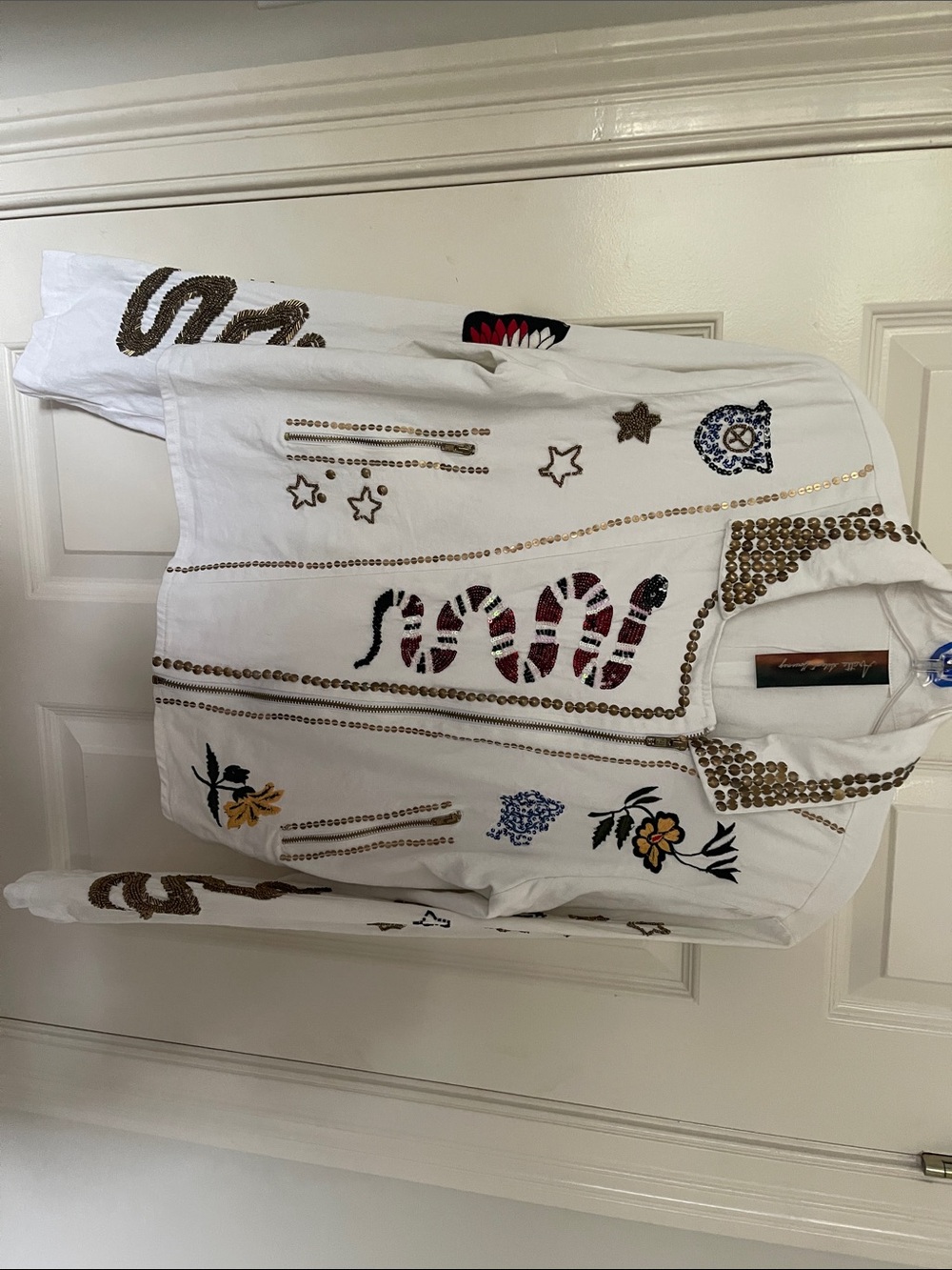 White beaded and embroidered zip up jacket